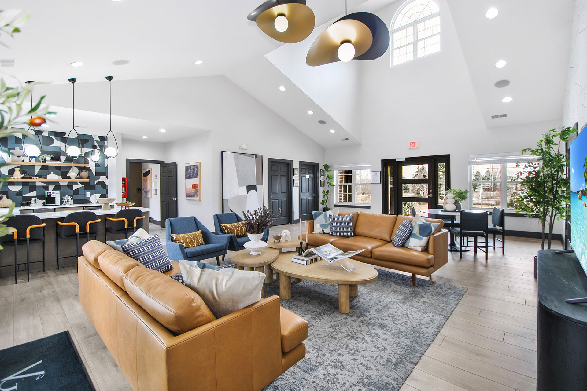 GLE-040125-006 exterior rendering of a brand new three-story apartment building and the parking lot